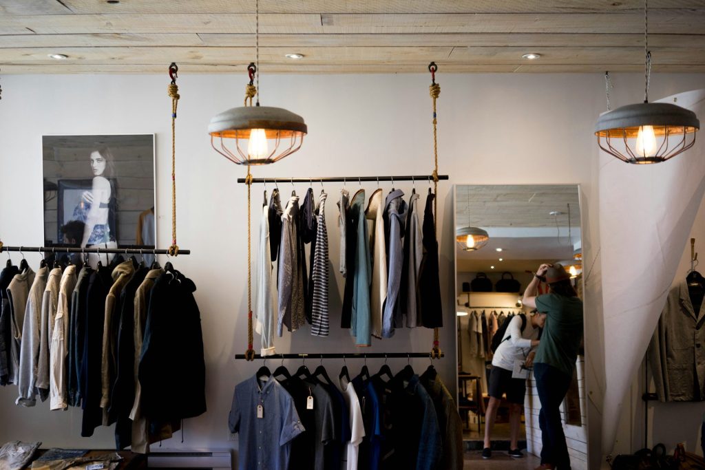 A boutique showcasing diverse outfits for customers