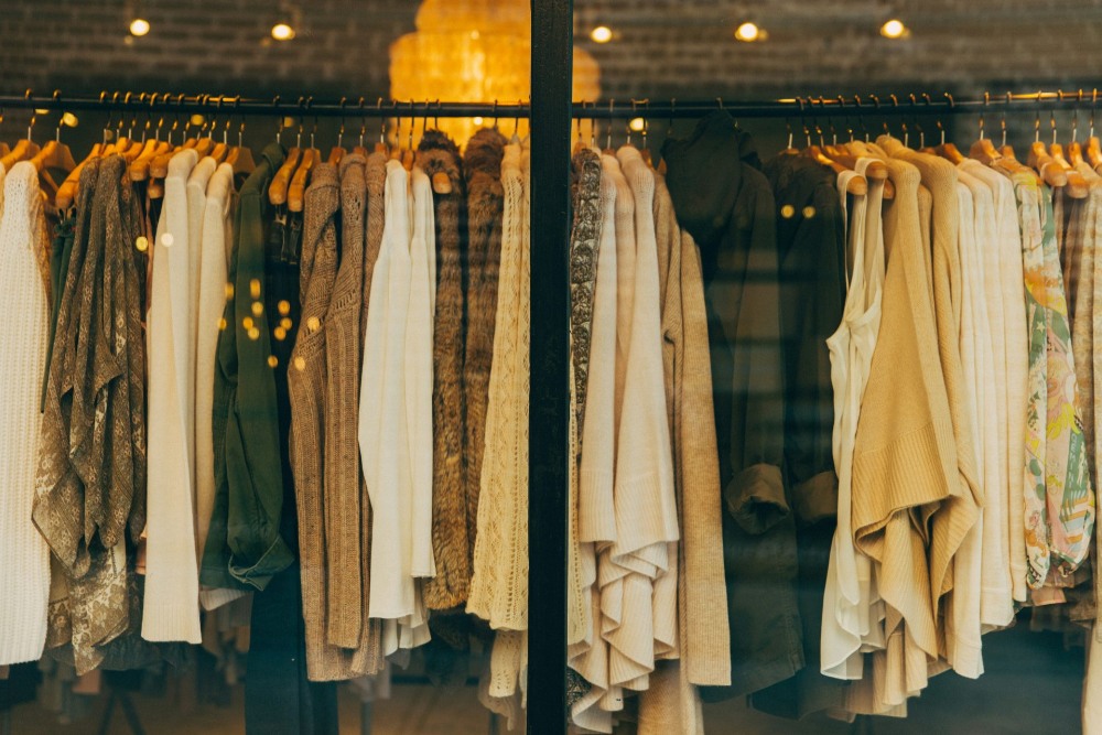 Clothes hanging in store display